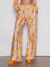 Pantalones con bolsillos elásticos y cintura holgada con estampado clásico